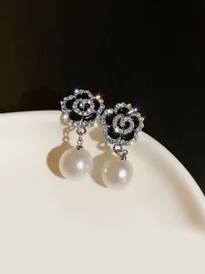 damen-ohrringe-mode-outdoor-blumen-ohrri-schwarz-1