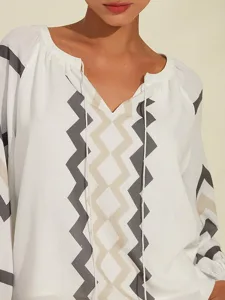 geometrisches-oberteil-mit-puffarmeln-un-default-3