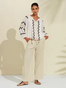 geometrisches-oberteil-mit-puffarmeln-un-default-4