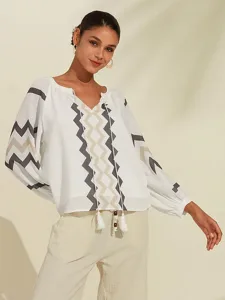 geometrisches-oberteil-mit-puffarmeln-un-wei-1