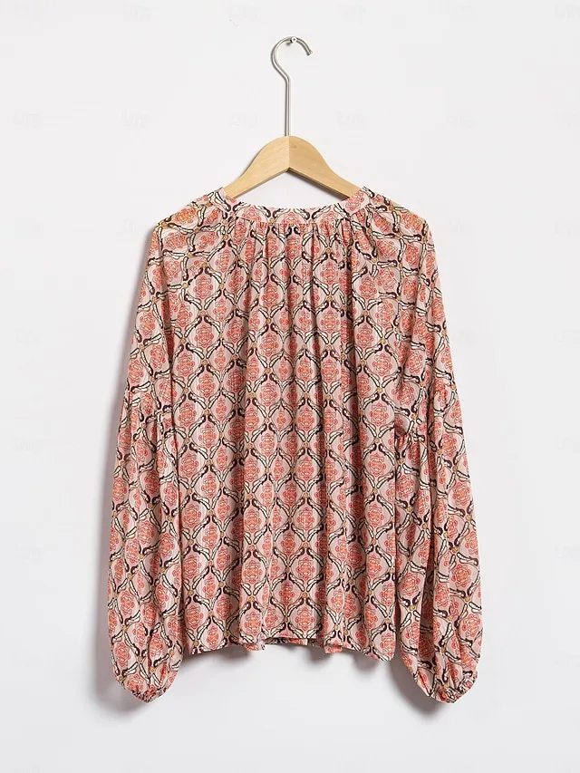 lassige-bluse-mit-geometrischen-puffarme-default-10