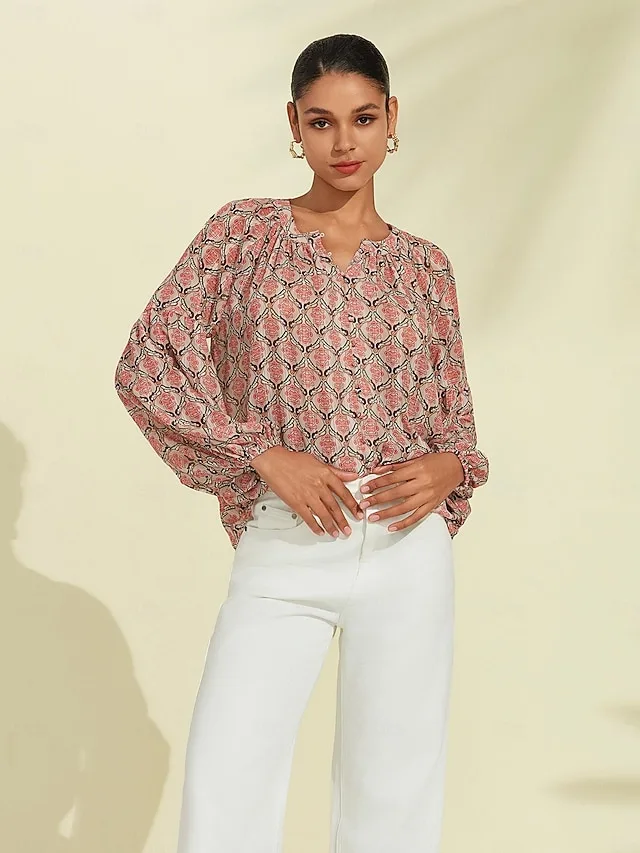 lassige-bluse-mit-geometrischen-puffarme-rote-1