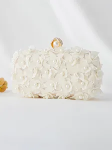 pochette-de-soiree-a-fleurs-et-sequins-p-amande-18