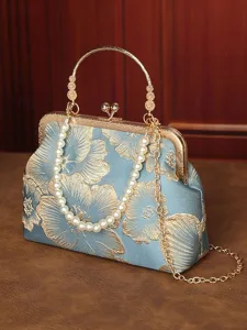 pochette-elegante-pour-femme-avec-anse-e-bleu-1